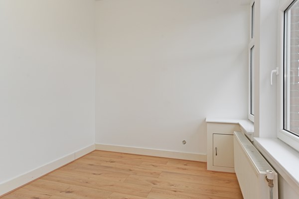 Medium property photo - Deimanstraat 309, 2522 BK Den Haag